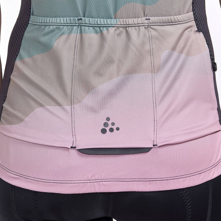 Maillot de ciclismo corto para mujer CRAFT en gris y turquesa, ideal para pedalear con estilo y comodidad