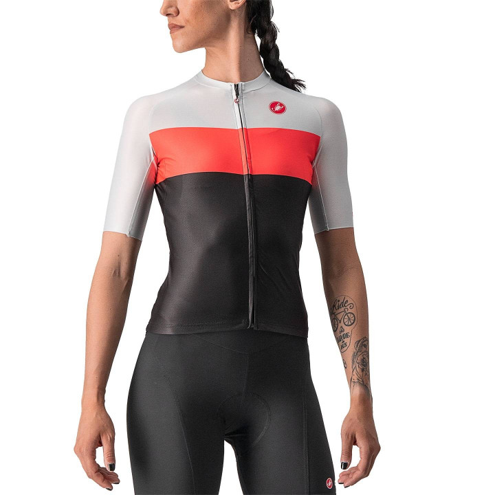 Maillot corto Aero Pro mujer en negro y naranja neón de CASTELLI para ciclistas que buscan estilo y comodidad