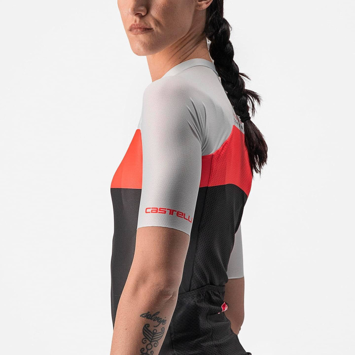 Maillot corto Aero Pro mujer en negro y naranja neón de CASTELLI para ciclistas que buscan estilo y comodidad