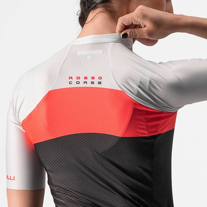 Maillot corto Aero Pro mujer en negro y naranja neón de CASTELLI para ciclistas que buscan estilo y comodidad