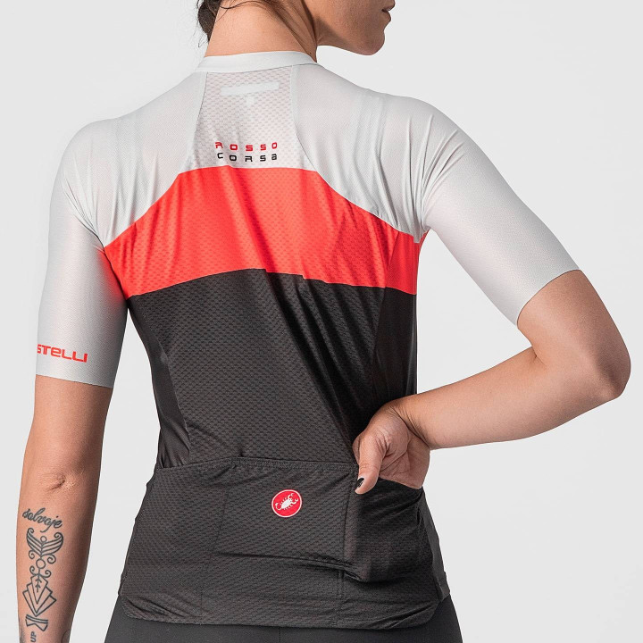 Maillot corto Aero Pro mujer en negro y naranja neón de CASTELLI para ciclistas que buscan estilo y comodidad
