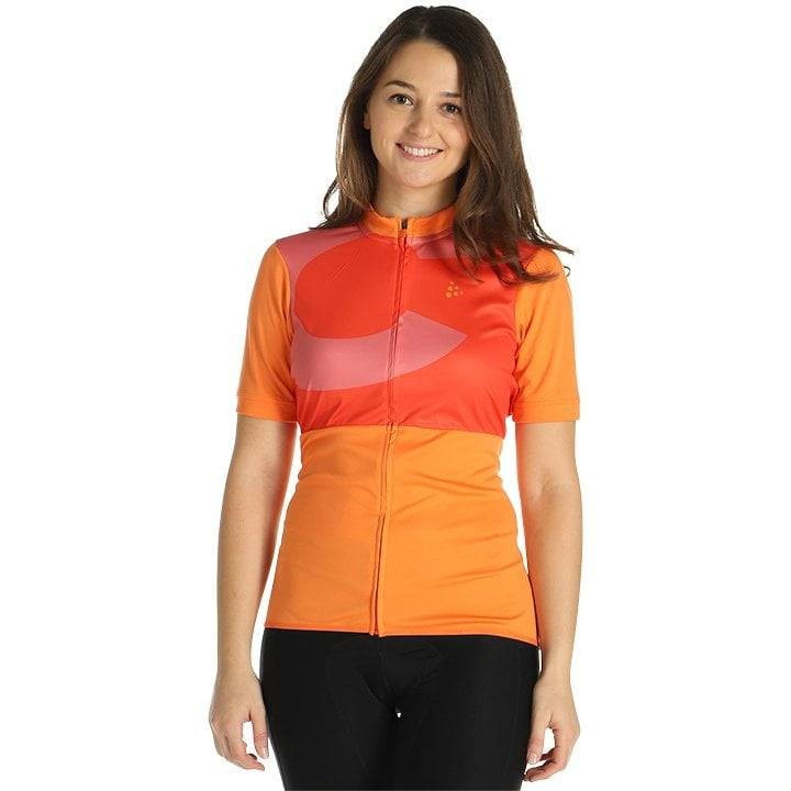 Maillot corto para mujer CRAFT Endurance en naranja y fucsia, ideal para tus rutas en bicicleta